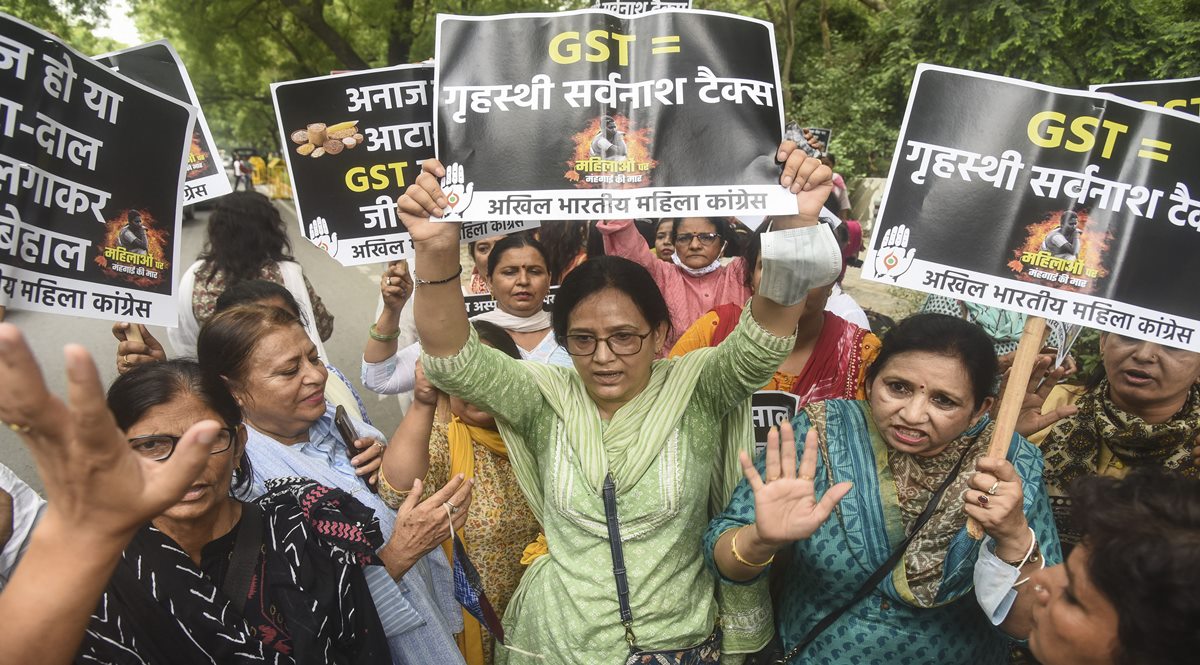 Akhil Bharatiya Mahila Congress activists raise slogans during a protest against hike in goods and services tax in New Delhi (PTI Image)