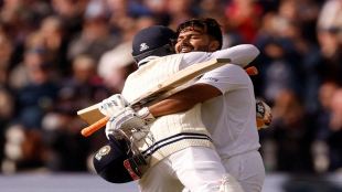 Rishabh Pant celebrates reaching his century with Ravindra Jadeja at the Fifth Test - England v India - in Birmingham (Reuters image)
