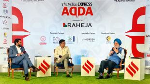 (From right) Union Minister Hardeep Singh Puri with P Vaidyanathan Iyer, Executive Editor, The Indian Express, and Anant Goenka, Executive Director, The Indian Express