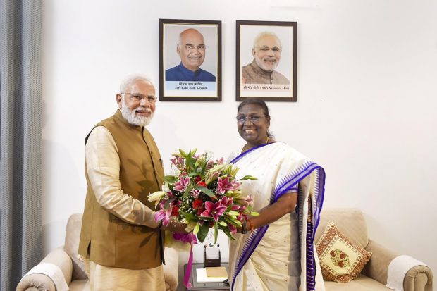Prime Minister Narendra Modi with NDA Presidential candidate Droupadi Murmu, who elected as first tribal woman President of India, in New Delhi. (PTI Photo)