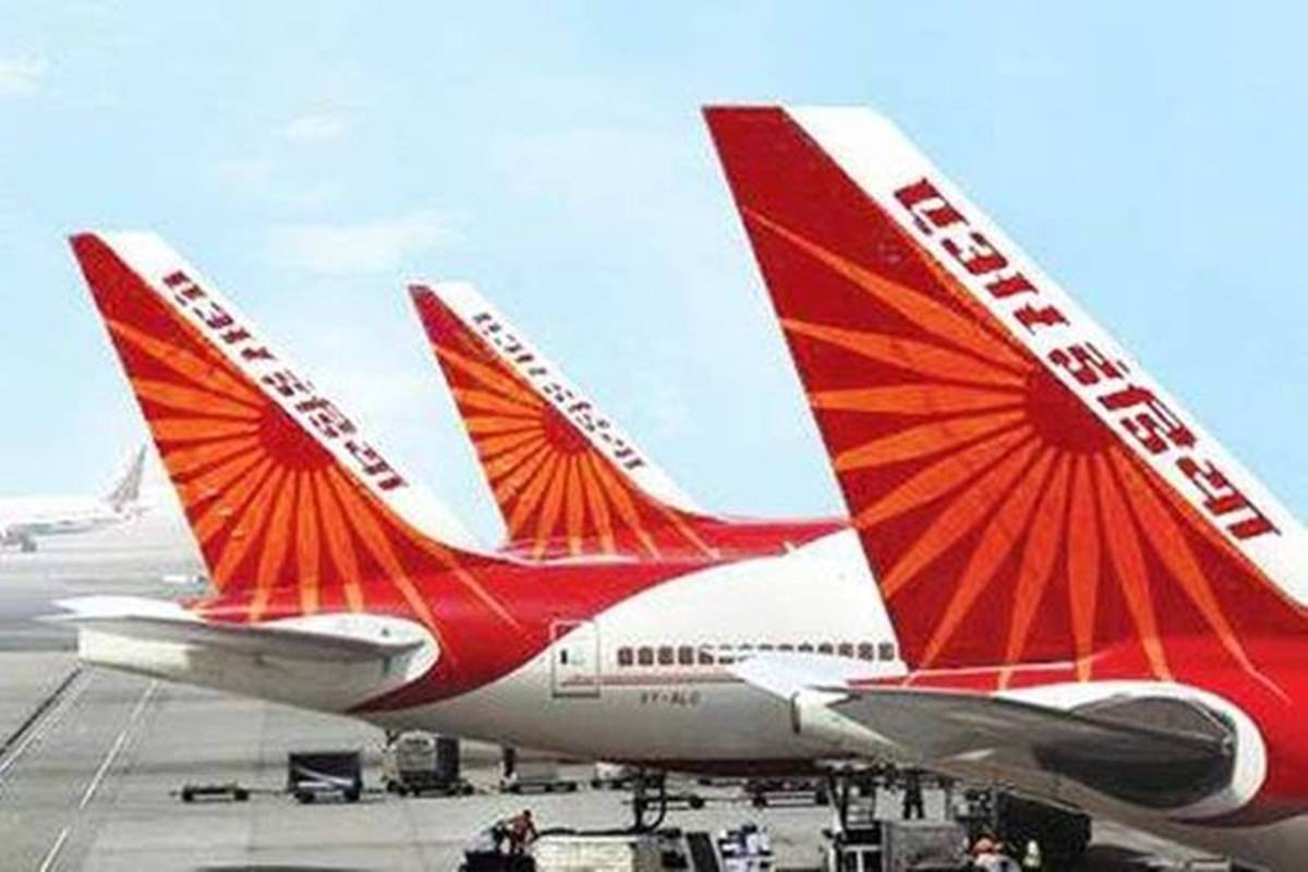 Air India flight from Dubai to Cochin diverts to Mumbai after pilot reports cabin pressure loss; DGCA grounds crew, plane