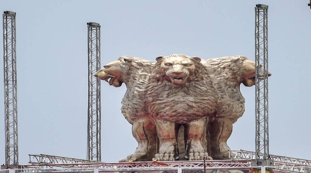 Emblem made up of bronze with a total weight of 9,500 kg and height of 6.5 metre, unveiled by Prime Minister Narendra Modi for new Parliament building on Monday. (PTI Photo)