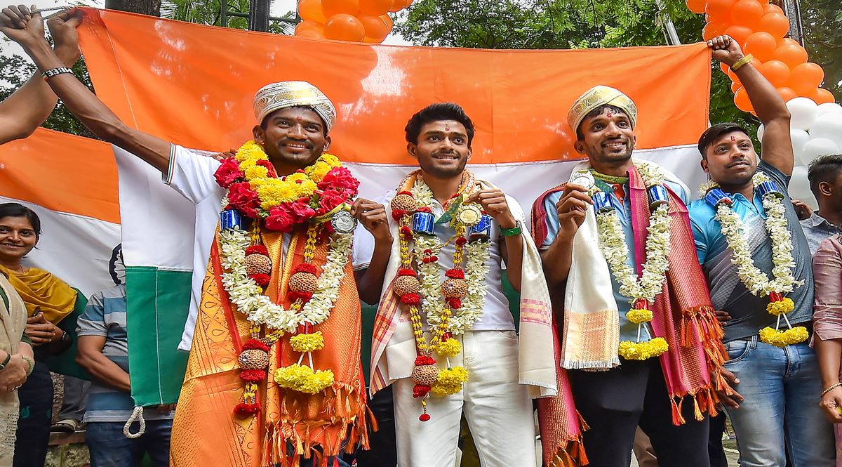 CWG 2022 triple jump gold medallist Eldhose Paul (centre), silver medallist Abdulla Aboobacker (right), steeplechase silver medal winner Avinash Sable (PTI Image)