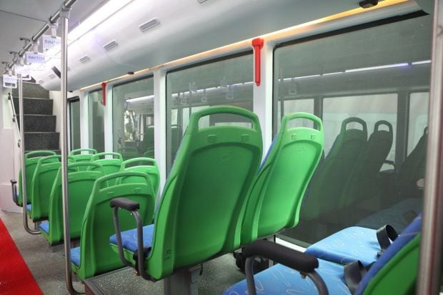 The large window's offer a very open view of the vehicle surroundings.