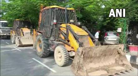 Bulldozer at noida housing complex