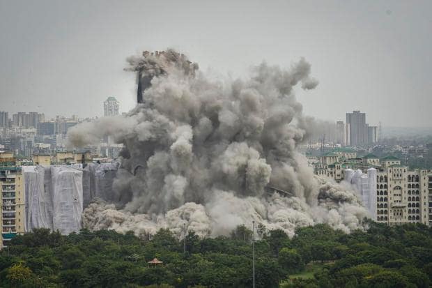 The Apex (32 floors) and Ceyane (29 floors) towers were under construction since 2009 within the Supertech Emerald Court housing society in Sector 93A of Noida, adjoining the national capital of Delhi.  (PTI Photo)