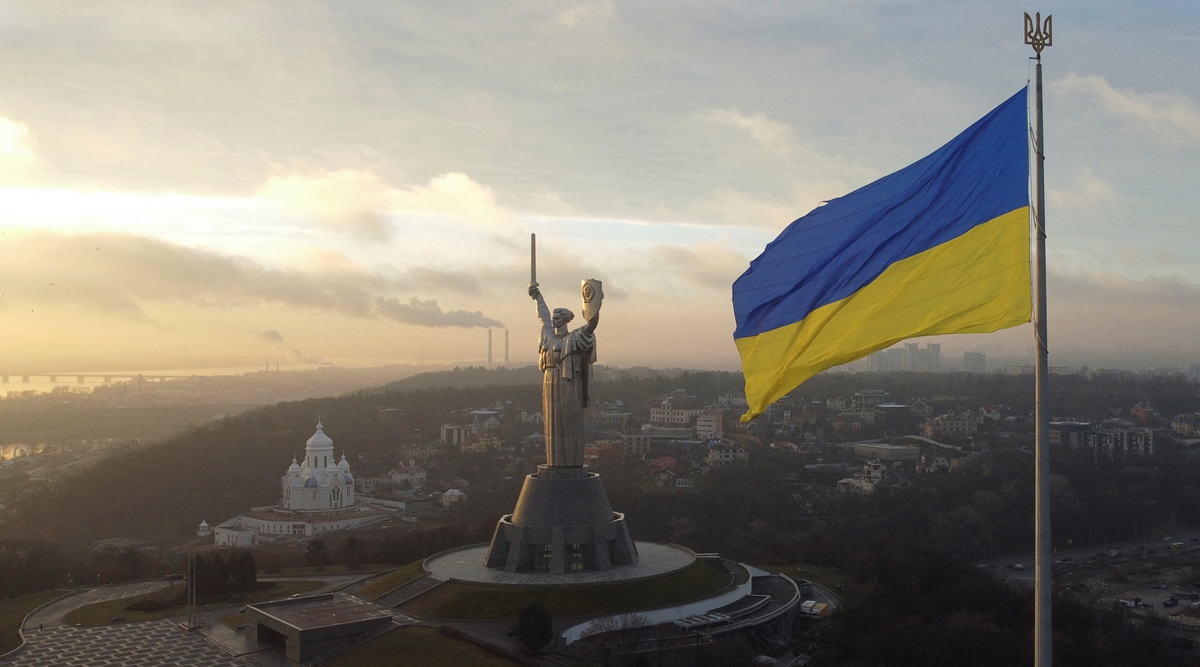 Ukraine's biggest national flag on the country's highest flagpole and the giant 'Motherland' monument are seen at a compound of the World War II museum in Kyiv, Ukraine, December 16, 2021. Picture taken with a drone. REUTERS/Valentyn Ogirenko Ukraine's biggest national flag on the country's highest flagpole and the giant 'Motherland' monument are seen at a compound of the World War II museum in Kyiv, Ukraine, December 16, 2021. Picture taken with a drone. REUTERS/Valentyn Ogirenko