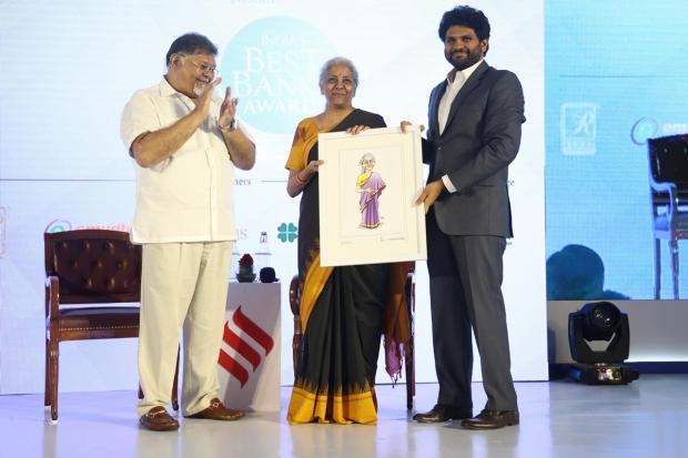 Finance Minister Nirmala Sitharaman along with Viveck Goenka, Chairman & Managing Director of The Indian Express and Anant Goenka Executive Director, Indian Express Group (Express Photo team)