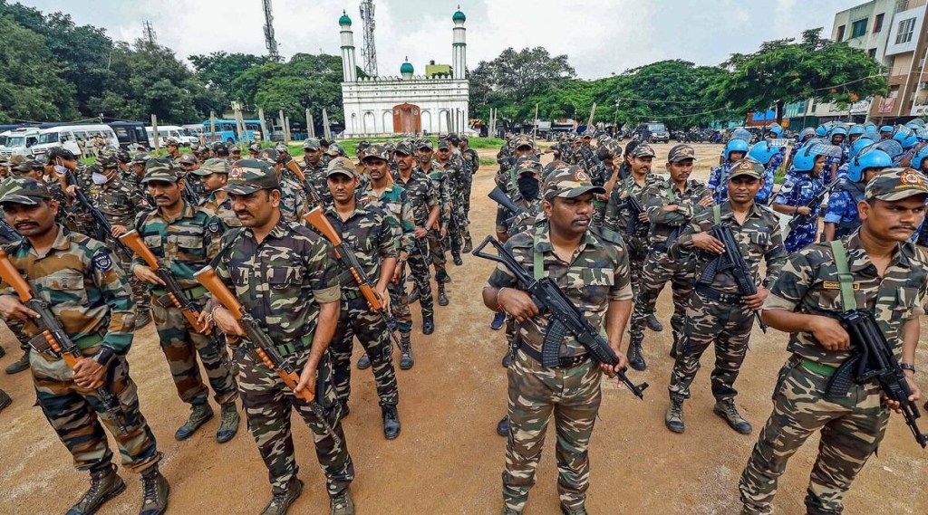 Heavy security outside Bengaluru's Idgah Maidan. (PTI) Heavy security outside Bengaluru's Idgah Maidan. (PTI)