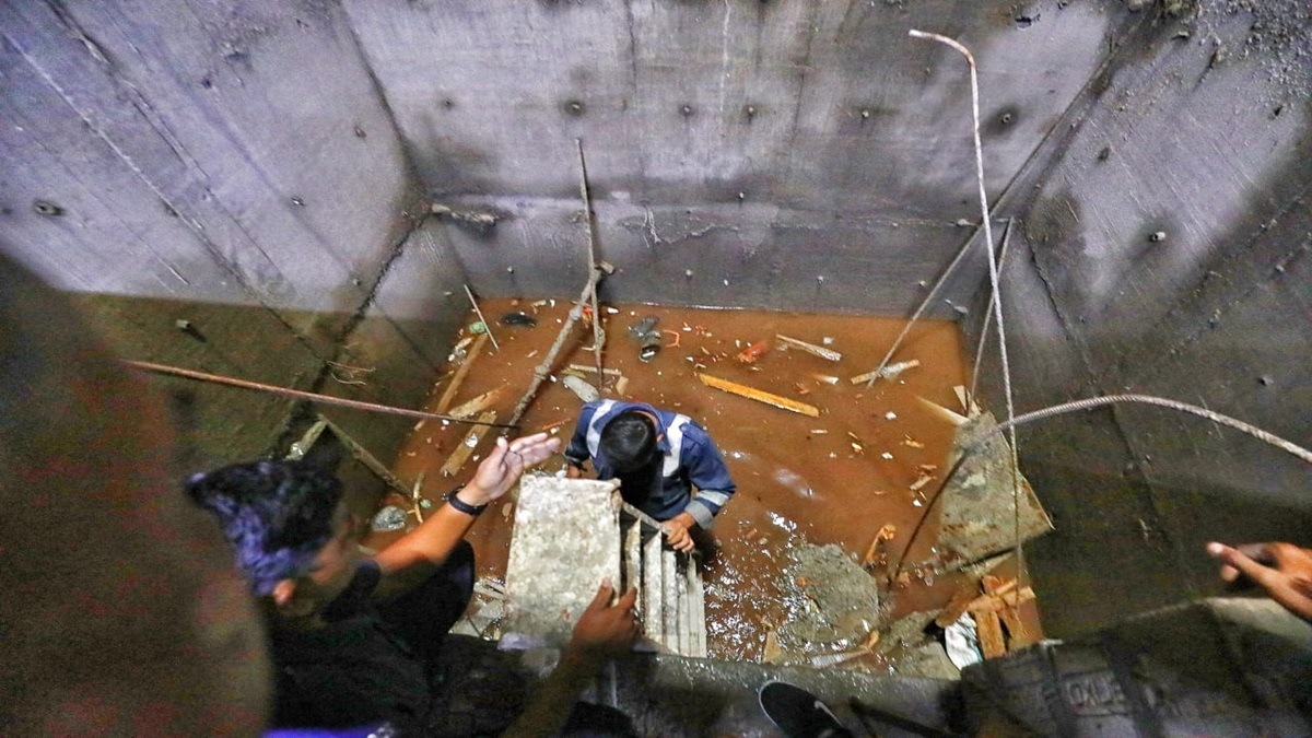 The incident took place at the under-construction Aspire II building in Ahmedabad today. (Express Photo/Nirmal Harindran)