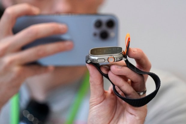A person holds an Apple Watch Ultra at an Apple event on the campus of Apple's headquarters in Cupertino, Calif., Wednesday, Sept. 7, 2022. (AP Photo)