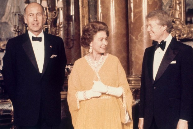 In this photo dated May 1977, U.S. President Jimmy Carter, right, and Queen Elizabeth II stand with French President Valery Giscard d'Estaing, at Buckingham Palace in London. (AP Photo)