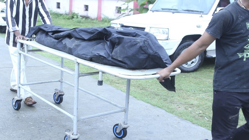 Mortal remains of one of two minor Dalit sisters allegedly raped and murdered being taken for post-mortem at a hospital in Lakhimpur Kheri on Thursday (PTI Photo)