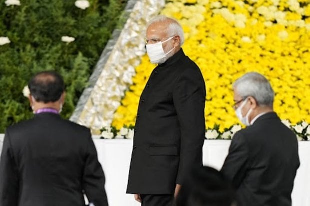 Prime Minister Narendra Modi walks after offering flowers during the state funeral of former Japanese Prime Minister Shinzo Abe at Nippon Budokan in Tokyo. Thousands of people are gathered in Tokyo to attend the state funeral for former prime minister Shinzo Abe, including foreign dignitaries and representatives from more than 200 countries and international organizations. (Photo: Reuters)