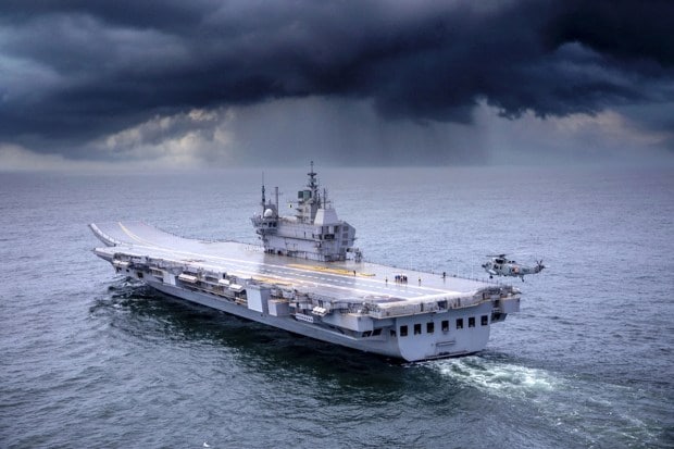 Kochi: In this undated file photo, the Indigenous Aircraft Carrier (IAC) Vikrant sails in the sea. IAC Vikrant will be commissioned by Prime Minister Narendra Modi on Sept. 2. (PTI Photo)