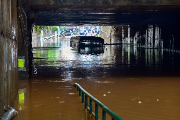 Ramnagar: A bus partially submerged at a flooded underpass on the Bengaluru-Mysuru highway following heavy monsoon downpour at Ramnagar, Karnataka, Monday, Aug. 29, 2022. (PTI Photo)