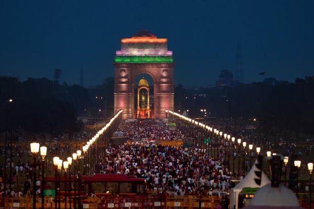 New Delhi: People visit the India Gate and the statue of Netaji Subhas Chandra Bose, at Kartavya Path in New Delhi. (PTI Photo)