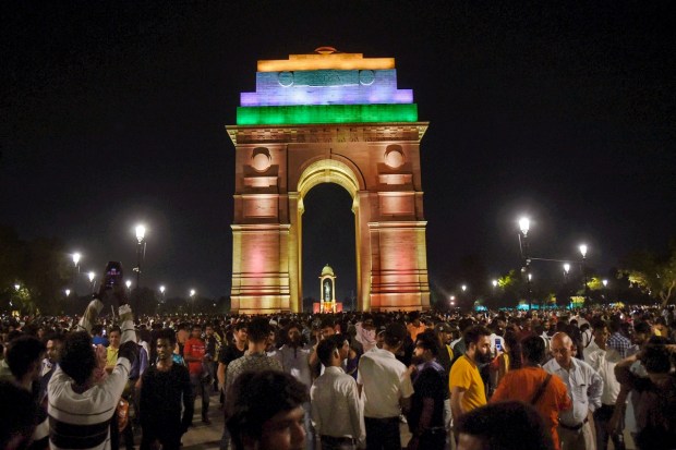 New Delhi: People visit the India Gate and the statue of Netaji Subhas Chandra Bose, at Kartavya Path in New Delhi. (PTI Photo)