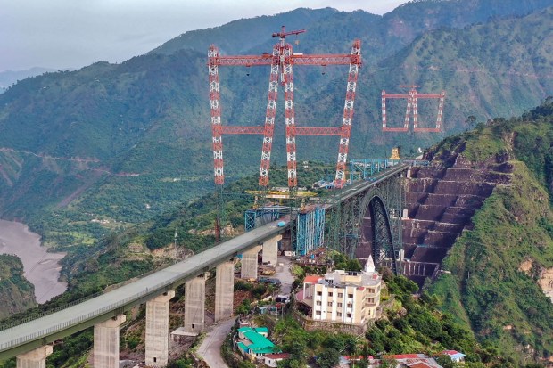 World's highest single-arch railway bridge over the Chenab river being made of steel and concrete. (PTI Photo)