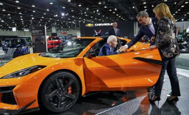 Biden hops into Corvette, declares Detroit 'back' at EV-focused auto show