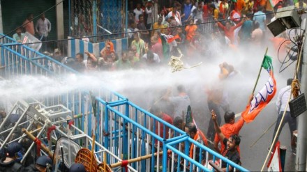 Police use water-cannons to disperse BJP protesters. (Express Photo by Shashi Ghosh)