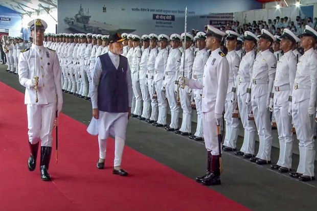 Kochi: Prime Minister Narendra Modi inspects a Guard of Honour during the commissioning ceremony of the first indigenously designed and built aircraft carrier, INS Vikrant, at Cochin Shipyard Limited in Kochi, Friday, Sept. 2, 2022. (PTI Photo)