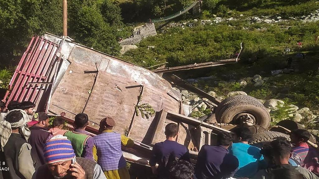 A mini-bus fell into a gorge near Brari Nallah in Poonch district on Wednesday. (PTI Photo)