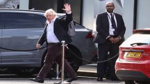 Former British Prime Minister Boris Johnson gestures, at Gatwick Airport, near London (Reuters image)