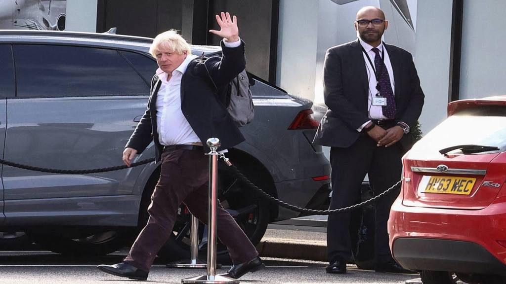 Former British Prime Minister Boris Johnson gestures, at Gatwick Airport, near London (Reuters image)