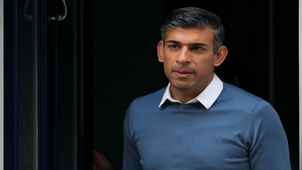 British Conservative MP Rishi Sunak leaves his home address in London (Reuters image)