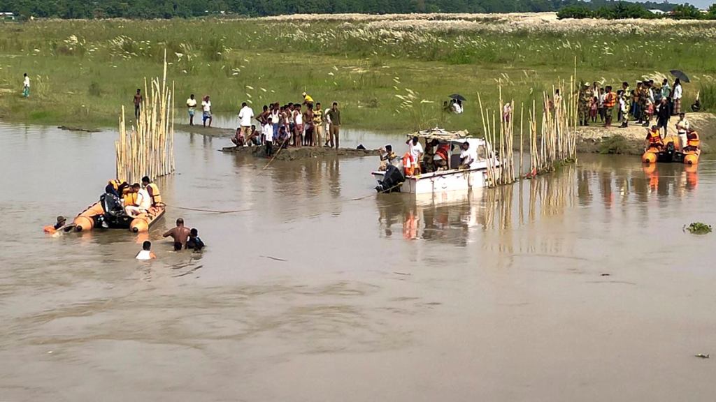 Rescue operations after a boat capsized in the Brahmaputra river, in Dhubri district on September 29, 2022. (PTI Photo)