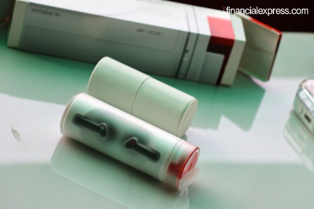 The Ear Stick unit is accessible from one end. On the other end, there's a cylindrical container housing paper-work and charging cable. (Photo credit: Saurabh Singh/Financial Express)