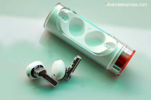 The charging case is cylindrical and unlocks via a twist mechanism from one end. You get a subtle and satsfying sound every time you do this. (Photo credit: Saurabh Singh/Financial Express)