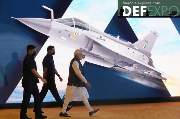 At the India Pavilion of the expo, PM Modi unveil HTT-40, the indigenous trainer aircraft designed by Hindustan Aeronautics Limited (HAL). (Photo: Ministry of Defence)
