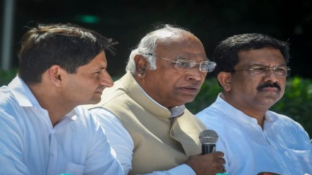 Mallikarjun Kharge with party leader Deepender Singh Hooda addresses a press conference in New Delhi, Sunday. (PTI Photo/Atul Yadav)