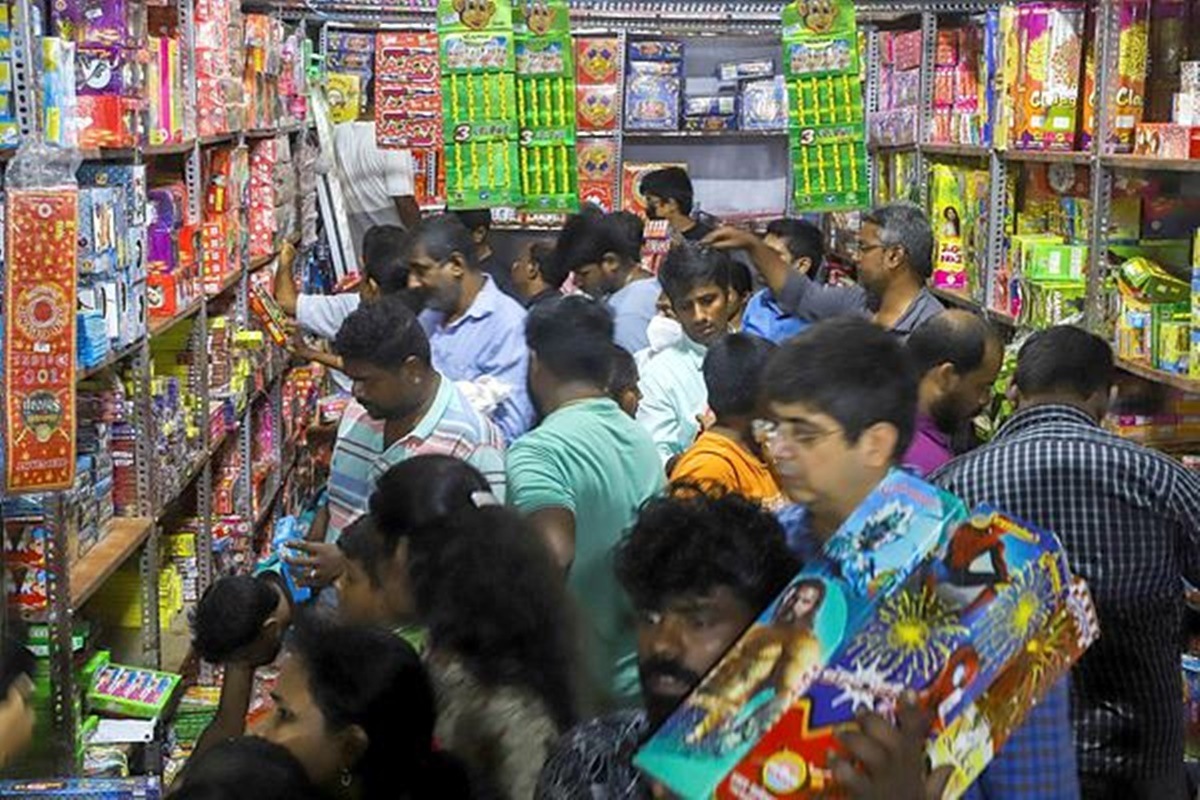 People shop for firecrackers ahead of Diwali festival, in Chennai. (PTI Photo)