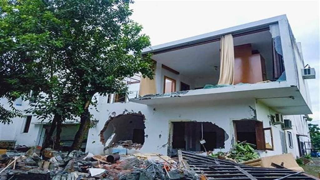 An illegally built resort of a man named Pulkit Arya after it was partially demolished by authorities overnight, in Pauri Garhwal district, on Saturday. (PTI Photo)