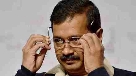 The Delhi CM was accompanied by security officials and senior party leaders as he walked through the crowd of revellers.