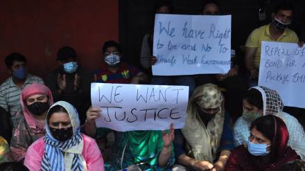 Kashmiri Pandits take part in a sit-in protest in Srinagar, against the killing of Kashmiri Pandit Rahul Bhat, on 14 May 2022. Express Photo by Shuaib Masoodi.