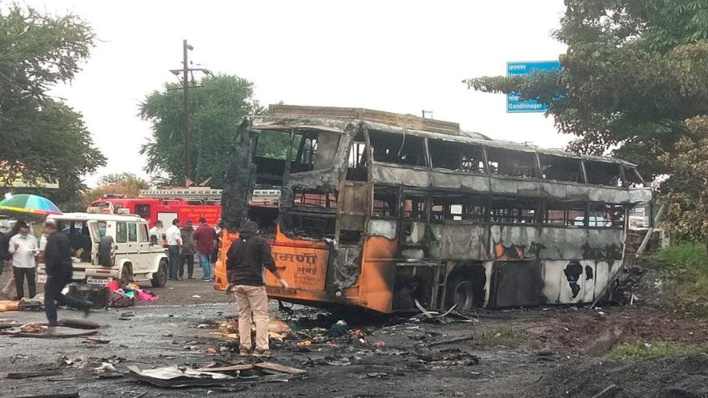 Charred remains of a bus after it hit a truck and caught fire on Aurangabad Road in Nashik district on Saturday (PTI Photo)
