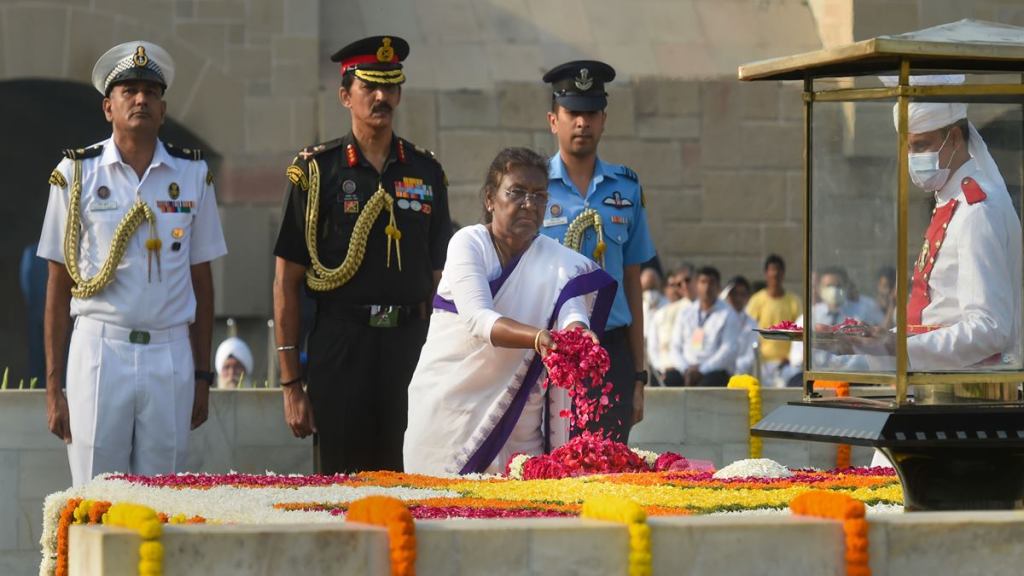 President Droupadi Murmu pays homage to Mahatma Gandhi on the occasion of his birth anniversary, at Rajghat in New Delhi, Sunday. (PTI Photo/Atul Yadav)