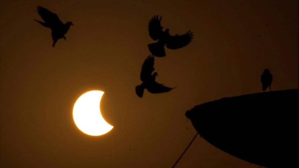 The first contact, where in the moon begins to cover the solar disc, happened at 4:29 pm in Delhi, where the moon was expected to cover 43 per cent of the solar disc. (PTI Photo/Manvender Vashist Lav)