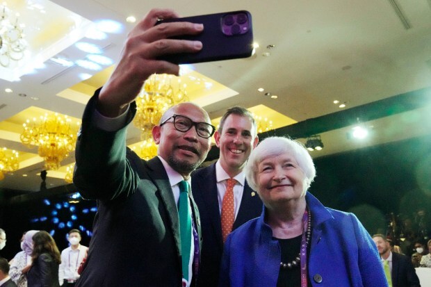 Co-Chair of the Pandemic Fund Chatib Basri, left, takes a selfie with US Treasury Secretary Janet Yellen, right, and Australia's Treasurer Jim Chalmers during the Launching of the Pandemic Fund2 at the 2nd G20 Joint Health and Finance Ministers Meeting in Nusa Dua, Bali, Indonesia, Sunday, November 13, 2022. (Photo source: AP)