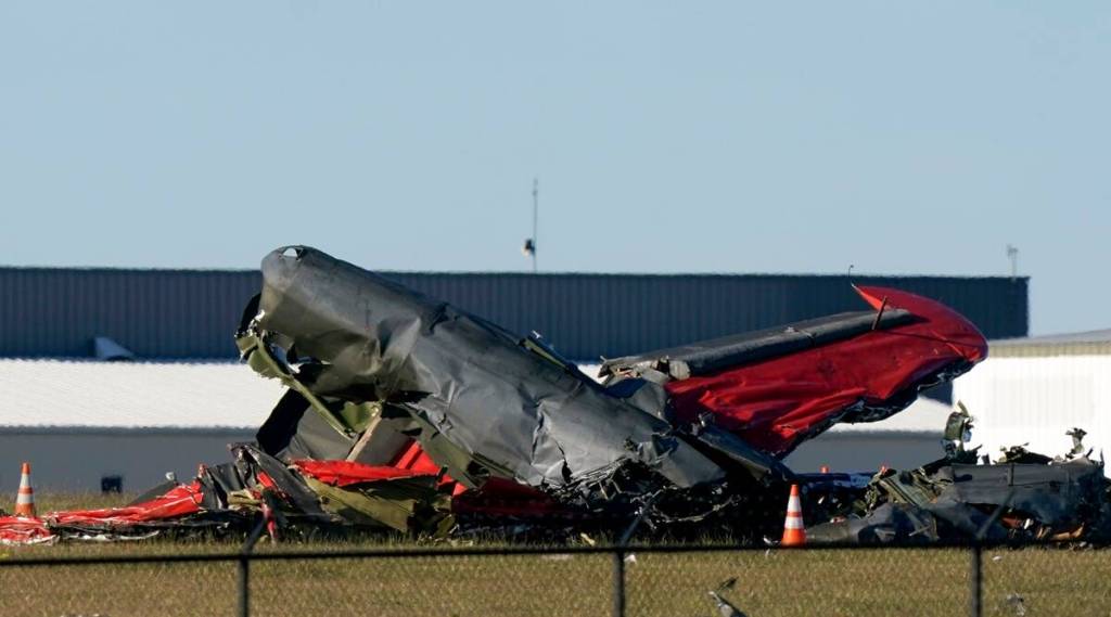 Debris from two planes that crashed during an airshow at Dallas Executive Airport (AP Image)