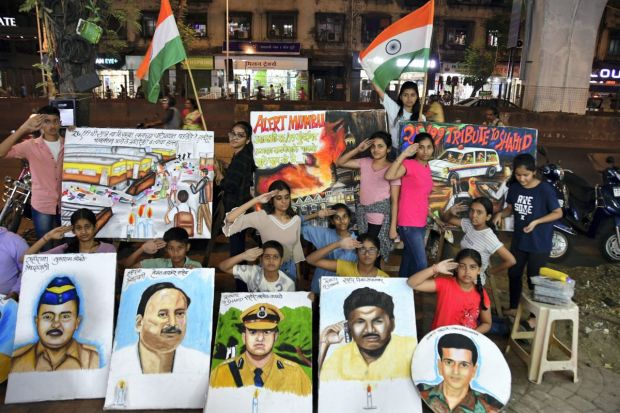 Art students pay tribute to the victims of 26/11 terror attacks, on the eve of the 14th anniversary of the tragedy in Mumbai. (PTI)