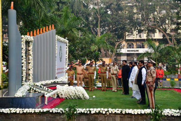 Maharashtra Chief Minister Eknath Shinde with Dy. CM Devendra Fadnavis pays homage at the Police Memorial on the occasion of the 14th anniversary of the 26/11 Mumbai terror attack. (PTI)