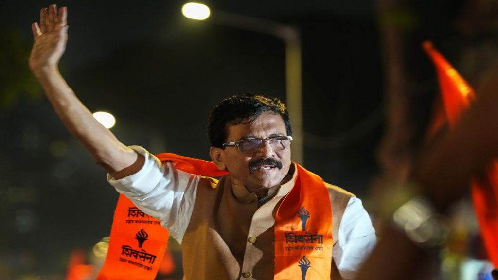 Shiv Sena (Uddhav Balasaheb Thackeray) leader Sanjay Raut waves at supporters following his release from Arthur Road Jail, at Byculla Junction in Mumbai, Wednesday, Nov. 9, 2022. (PTI Photo)