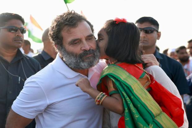 Congress leader Rahul Gandhi with a young supporter during the party's 'Bharat Jodo Yatra', in Hingoli district. (PTI Photo)