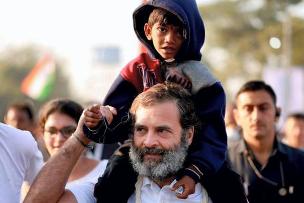 Congress leader Rahul Gandhi with a young supporter during the party's 'Bharat Jodo Yatra', in Buldhana district. (PTI Photo)