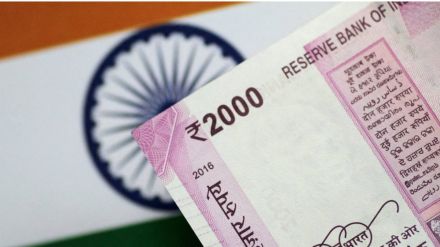 Indian rupee notches first monthly gain this year, but lags Asian peers